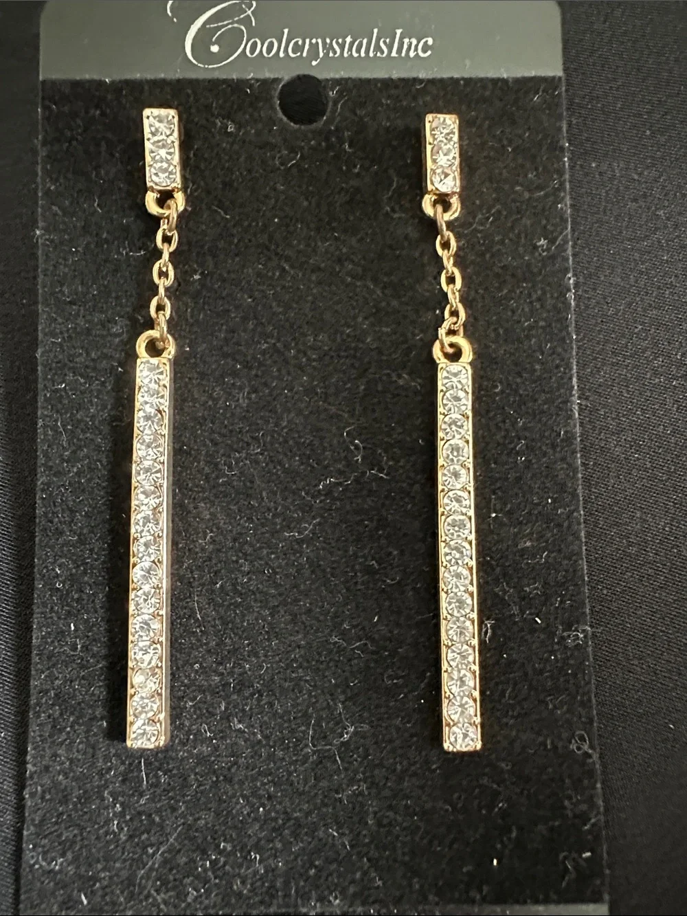 Rhinestone crystal & goldtone NWT dangle earrings. Slender style w/ 2-1/2” drop